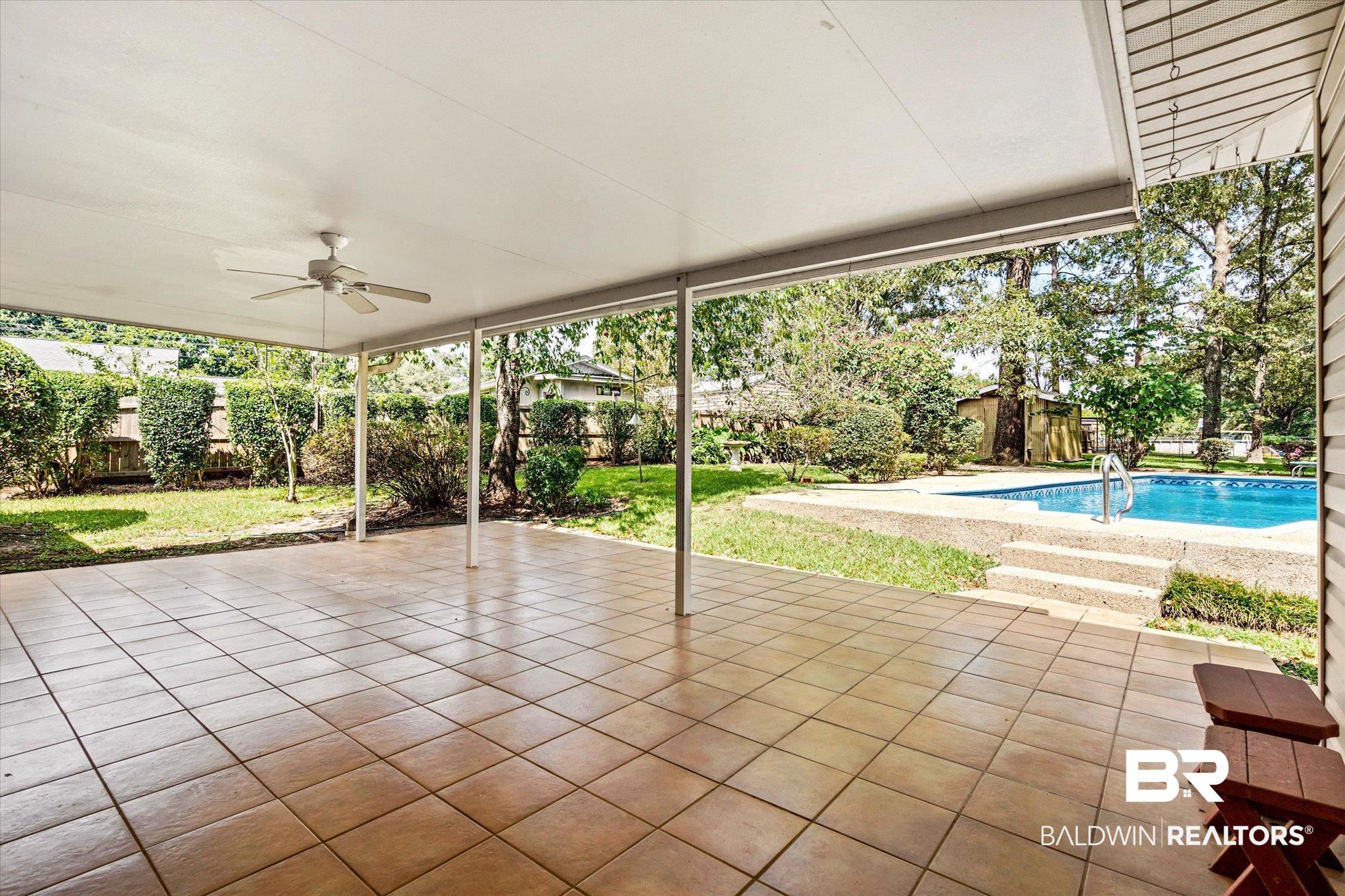 9623 Sunview Drive Semmes, AL 36575 - Photo 24 of 30 View of patio with a fenced in pool and ceiling fan