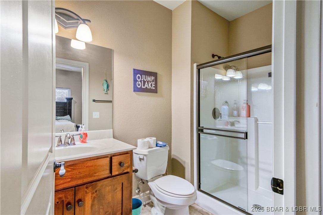 3168 Twin Rivers Point, Unit 2E Camdenton, MO 65020 - Photo 14 of 52 Private ensuite bath.