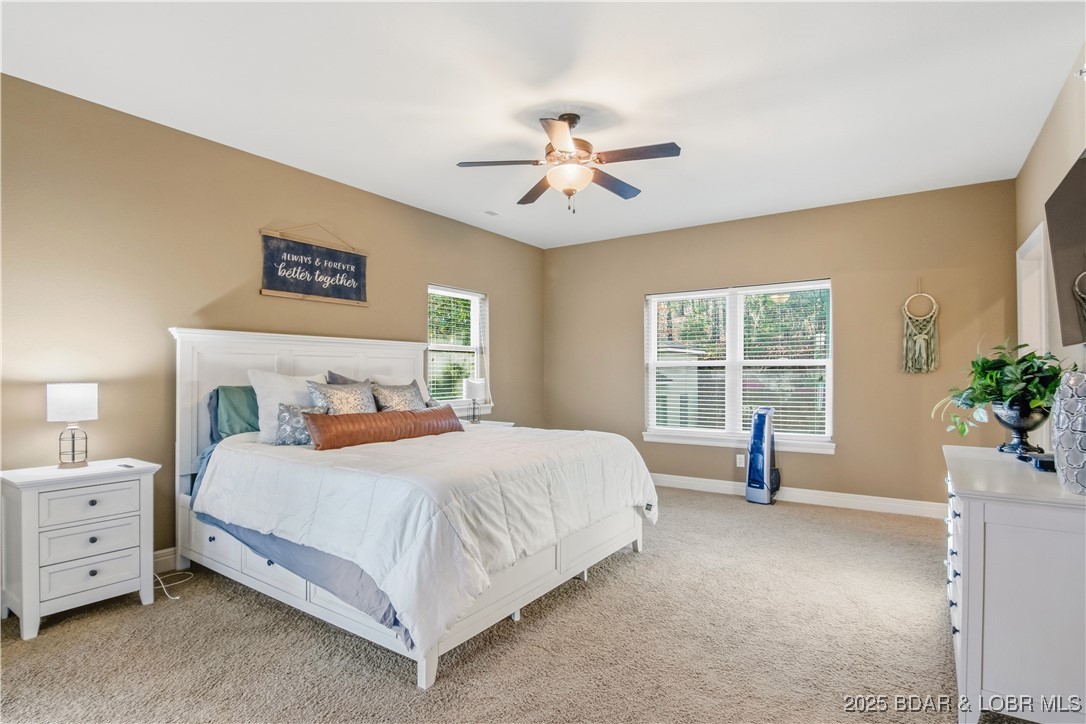 3168 Twin Rivers Point, Unit 2E Camdenton, MO 65020 - Photo 22 of 52 Enter the very spacious primary bedroom.