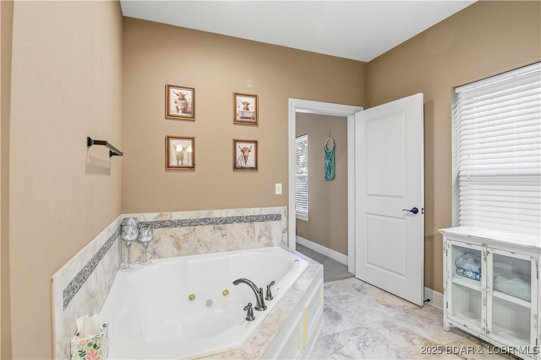 3168 Twin Rivers Point, Unit 2E Camdenton, MO 65020 - Photo 36 of 52 Relax in your jetted tub after a long day.