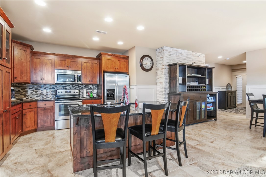 3168 Twin Rivers Point, Unit 2E Camdenton, MO 65020 - Photo 3 of 52 Breakfast bar seating for three.