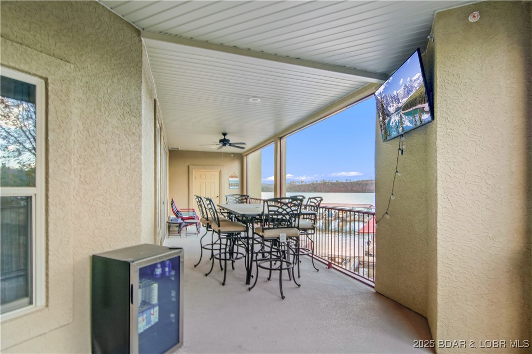 3168 Twin Rivers Point, Unit 2E Camdenton, MO 65020 - Photo 43 of 52 The patio is perfect for entertaining guest on sum