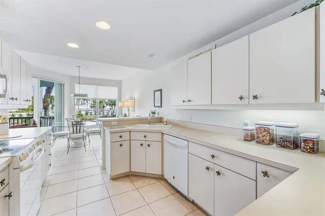 a bedroom with a large bed and a view of bedroom