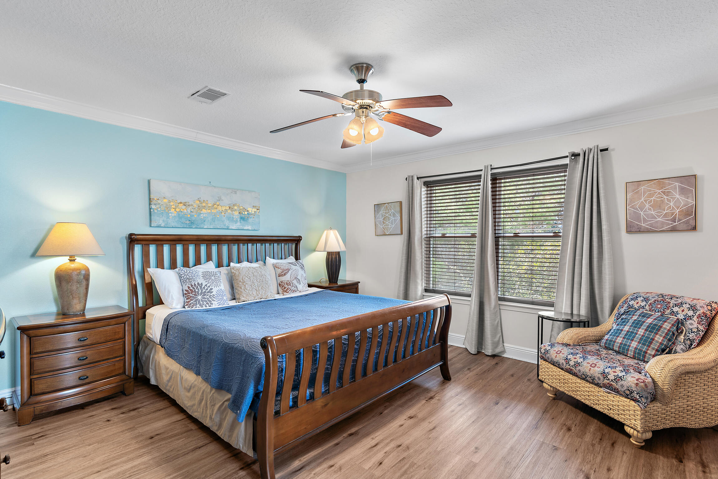 19 Charming Way Santa Rosa Beach, FL 32459 - Photo 21 of 52 a bedroom with a bed and a chandelier
