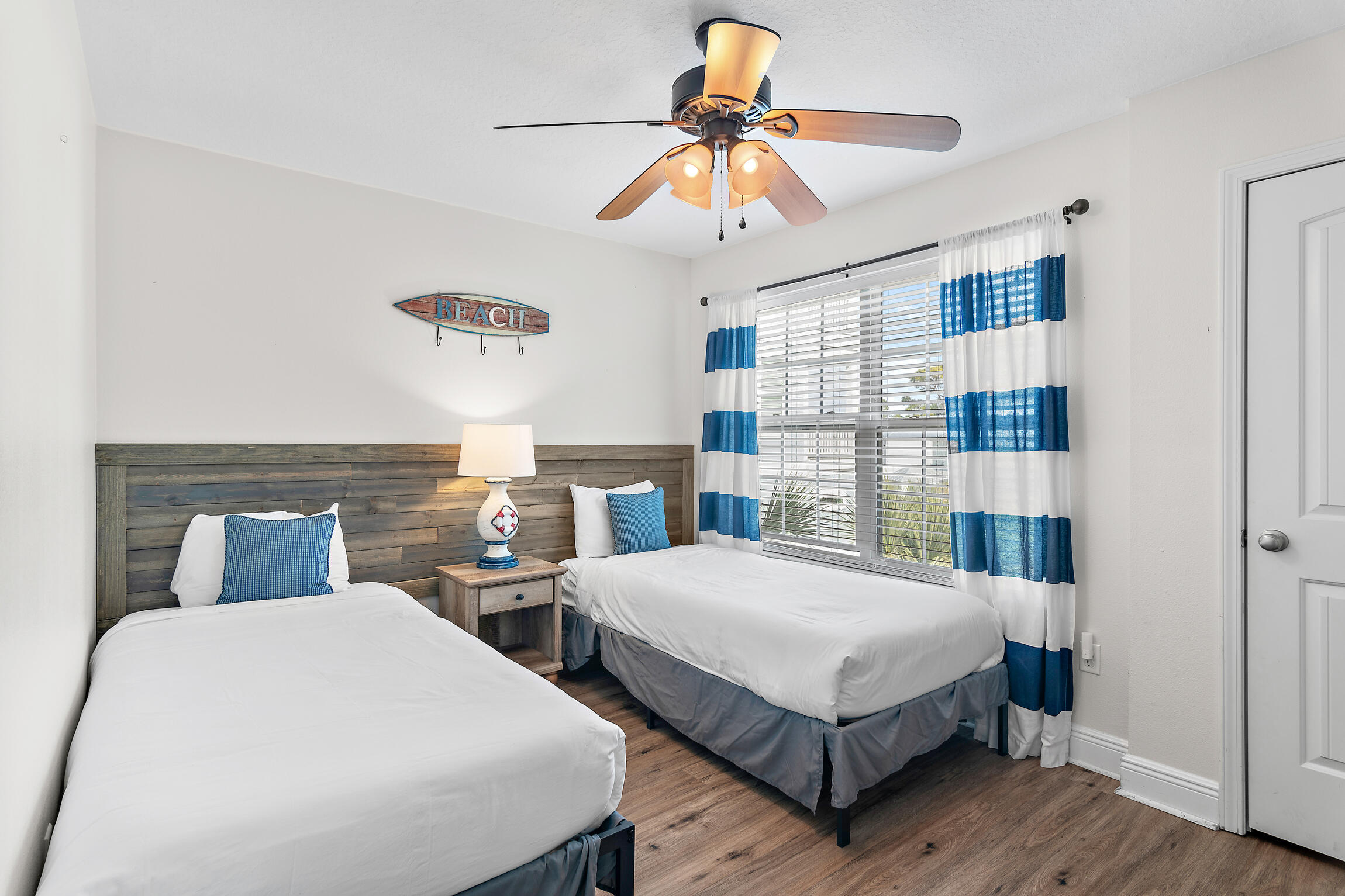 19 Charming Way Santa Rosa Beach, FL 32459 - Photo 31 of 52 a bedroom with a bed and window