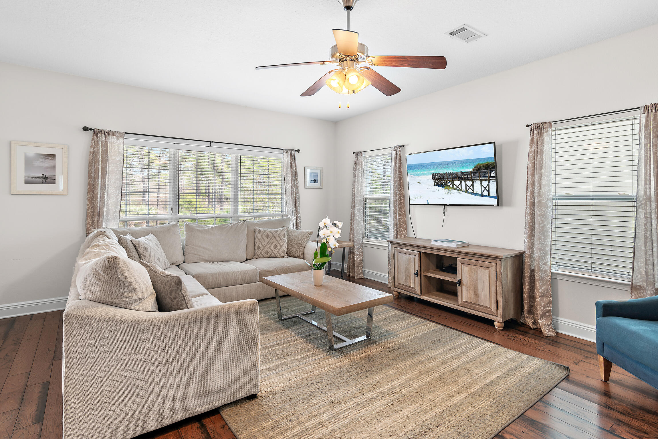 19 Charming Way Santa Rosa Beach, FL 32459 - Photo 4 of 52 a living room with furniture and a flat screen tv