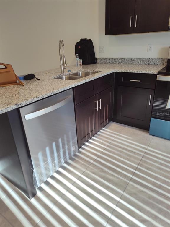 16265 Southwest 29th Court Road Ocala, FL 34473 - Photo 6 of 8 a kitchen with a sink and cabinets