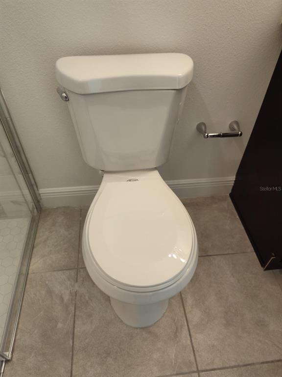 16265 Southwest 29th Court Road Ocala, FL 34473 - Photo 8 of 8 a bathroom with a toilet and a mirror