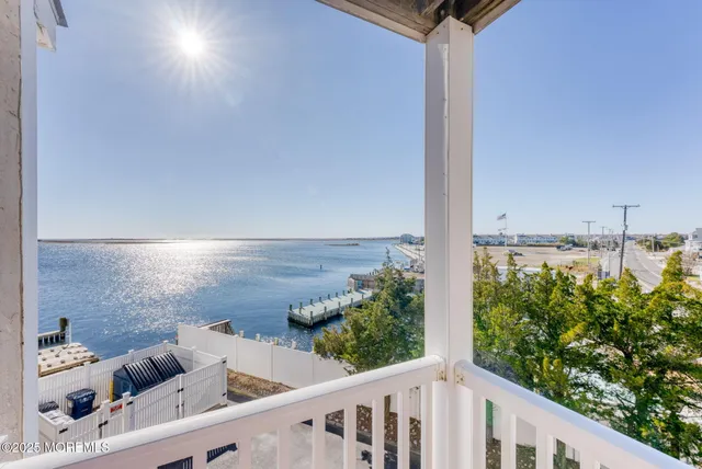 a view of balcony and yard