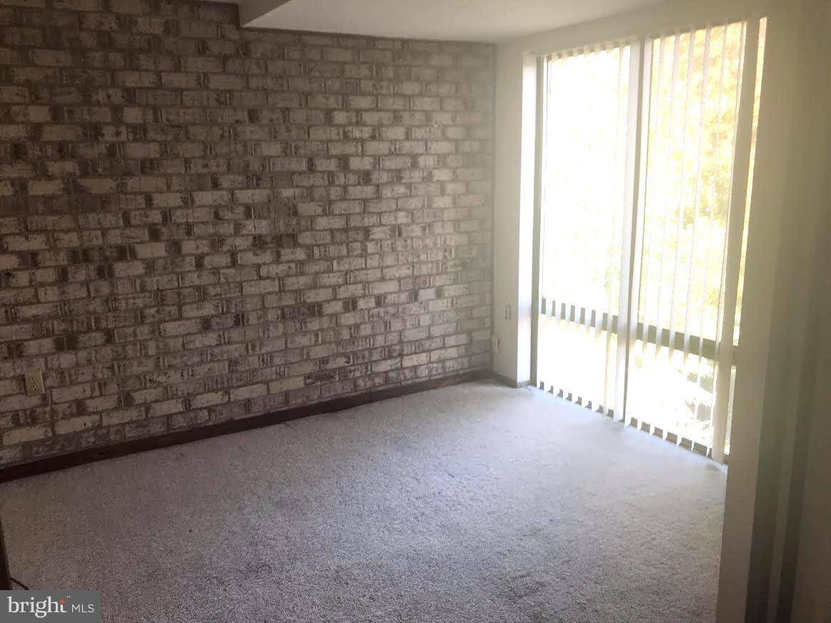 10024 Stedwick Road, Unit 304 Gaithersburg, MD 20886 - Photo 8 of 9 Den