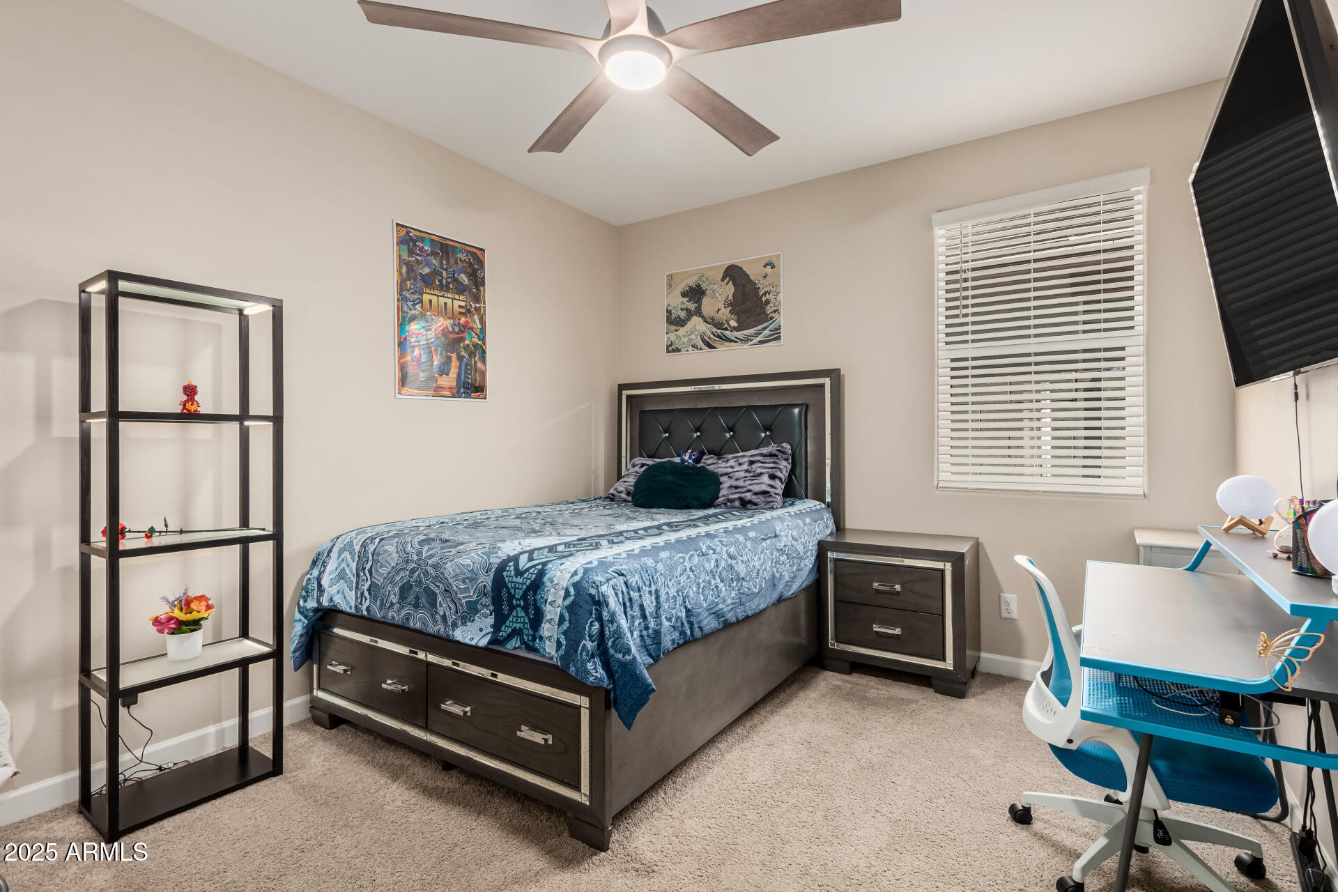 2475 West Spaulding Avenue Apache Junction, AZ 85120 - Photo 33 of 58 a bedroom with a bed and a desk