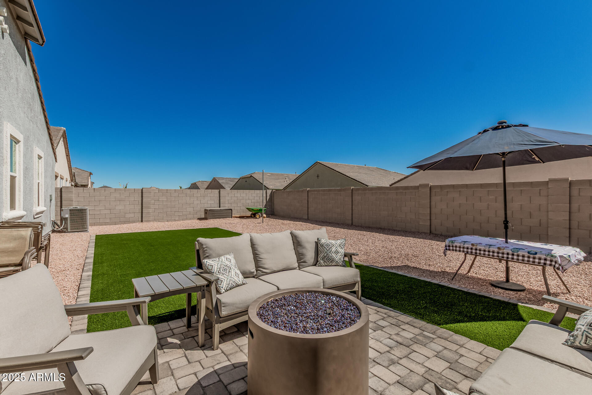 2475 West Spaulding Avenue Apache Junction, AZ 85120 - Photo 42 of 58 a view of backyard of house with seating space