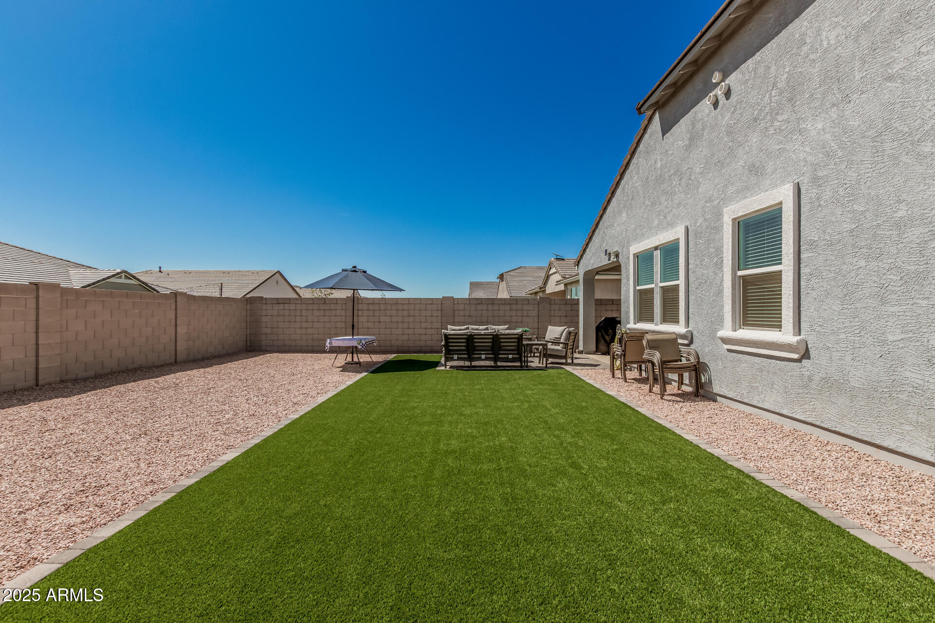2475 West Spaulding Avenue Apache Junction, AZ 85120 - Photo 43 of 58 a house view with a sitting space