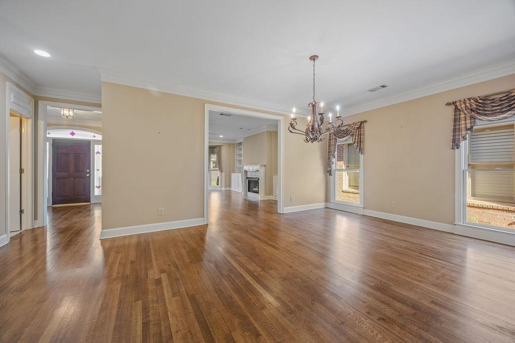 8009 Fox Fern Road Germantown, TN 38138 - Photo 13 of 40 a view of a livingroom with wooden floor
