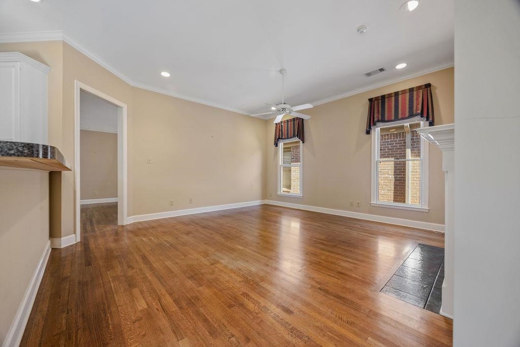 8009 Fox Fern Road Germantown, TN 38138 - Photo 17 of 40 a view of livingroom with hardwood floor and hallway