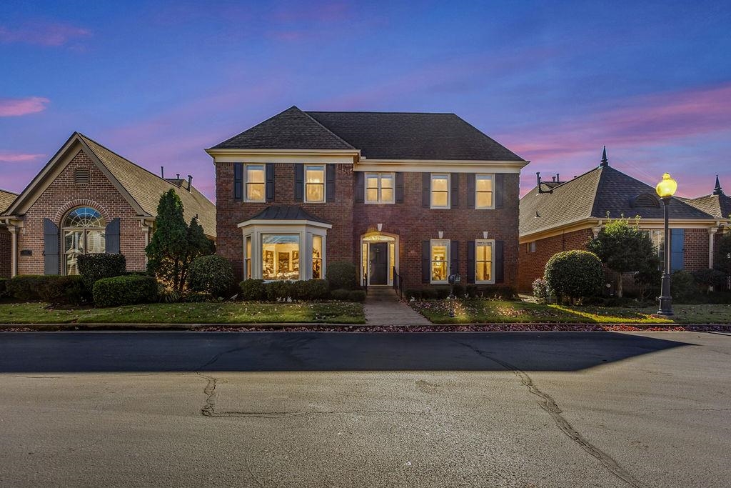 8009 Fox Fern Road Germantown, TN 38138 - Photo 2 of 40 a front view of a house with garden