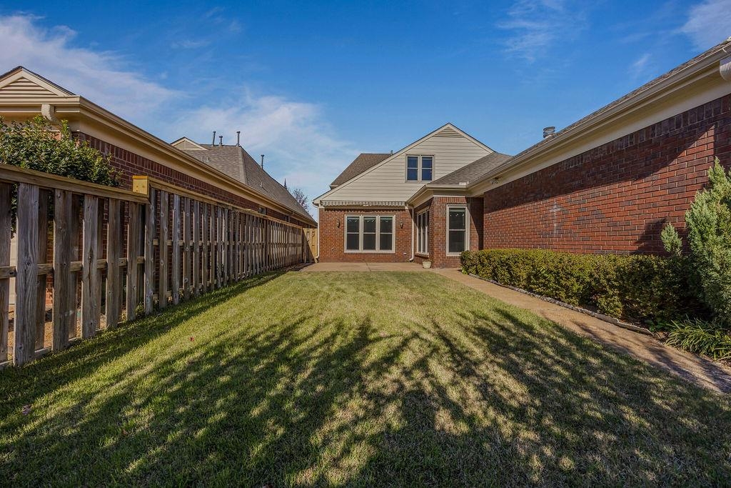 8009 Fox Fern Road Germantown, TN 38138 - Photo 27 of 40 a view of a house with a small yard