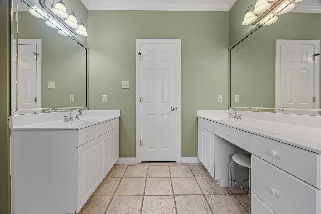 8009 Fox Fern Road Germantown, TN 38138 - Photo 32 of 40 a bathroom with a sink a toilet and a mirror