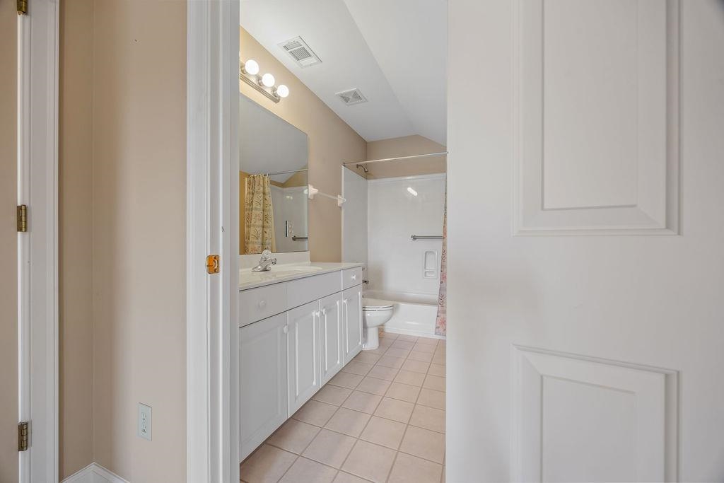 8009 Fox Fern Road Germantown, TN 38138 - Photo 35 of 40 a bathroom with a sink and a mirror