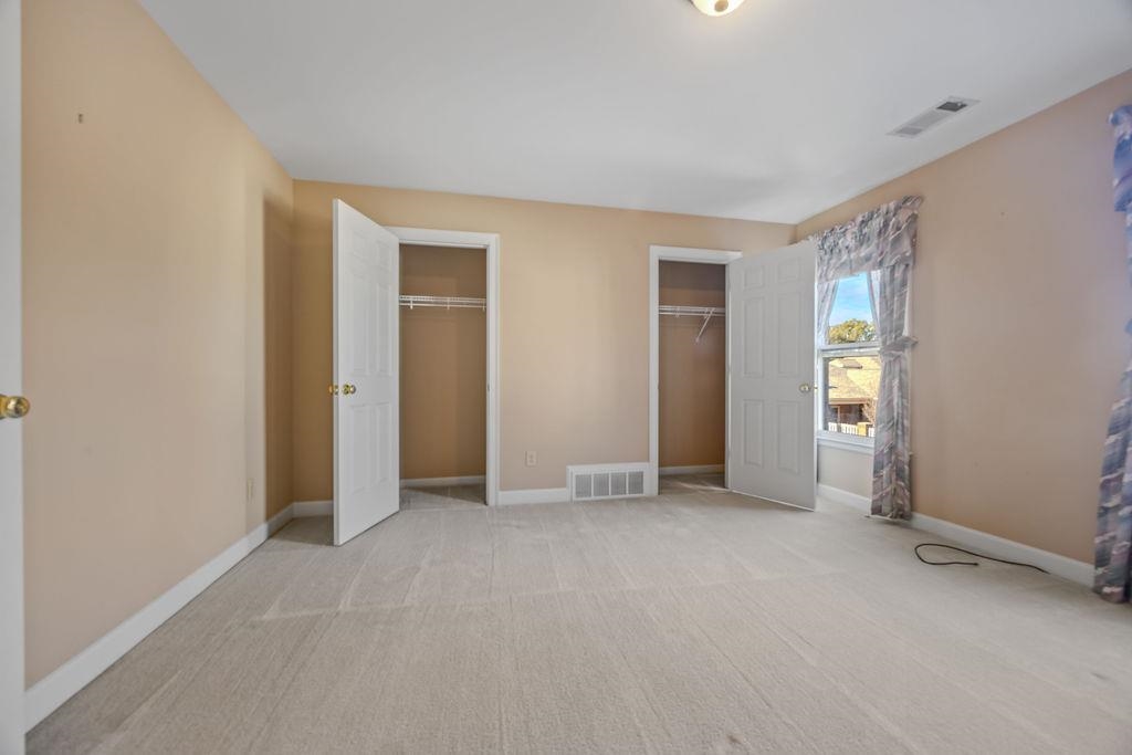 8009 Fox Fern Road Germantown, TN 38138 - Photo 36 of 40 a view of an empty room with closet and a window