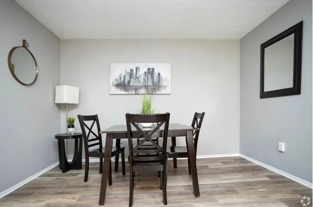 a view of a dining room with furniture