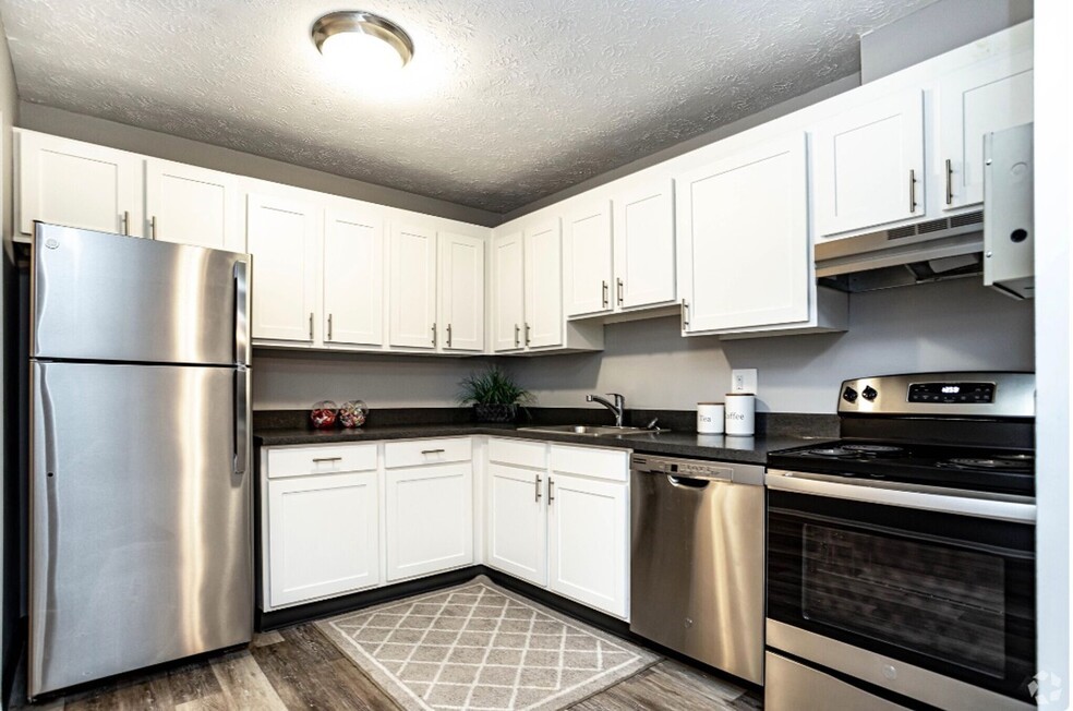 101 Lafayette Road Syracuse, NY 13205 - Photo 17 of 25 a kitchen with stainless steel appliances granite countertop a refrigerator sink and cabinets