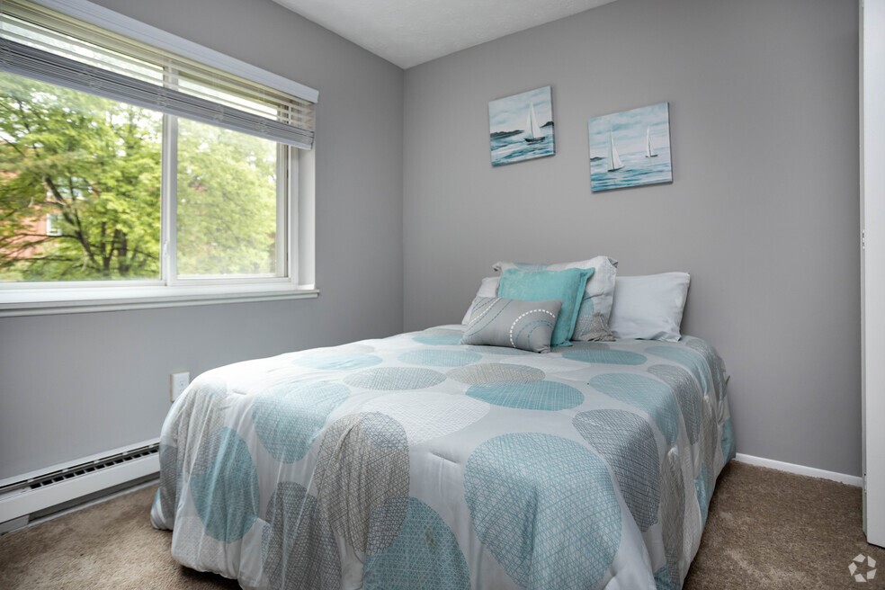 101 Lafayette Road Syracuse, NY 13205 - Photo 21 of 25 a bedroom with a bed and window