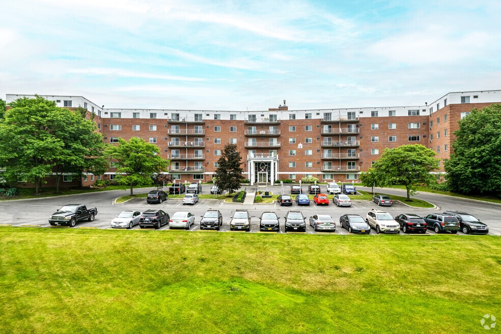 101 Lafayette Road Syracuse, NY 13205 - Photo 4 of 25 a view of a lake with a car parked in front of it