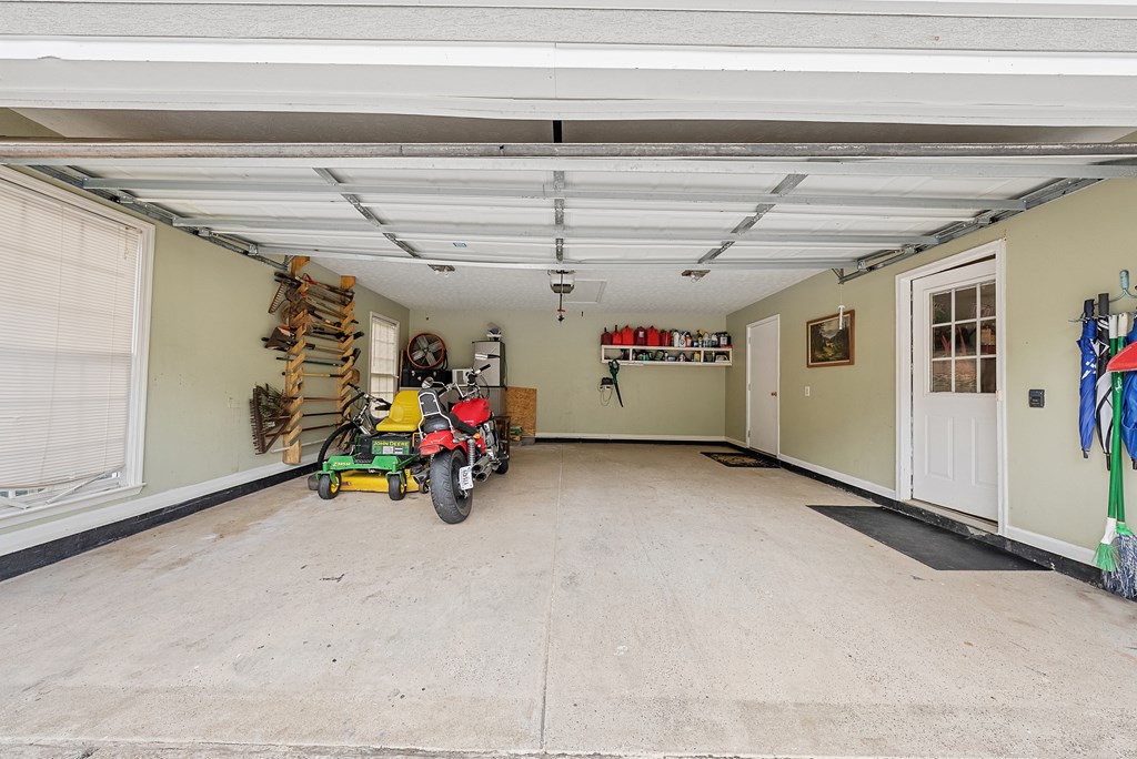 370 Evergreen Drive Fortson, GA 31808 - Photo 26 of 32 a view of a garage with a bike and garage