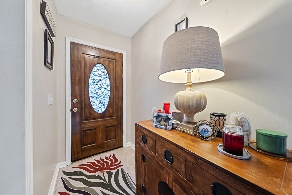 370 Evergreen Drive Fortson, GA 31808 - Photo 3 of 32 a room with furniture and a mirror