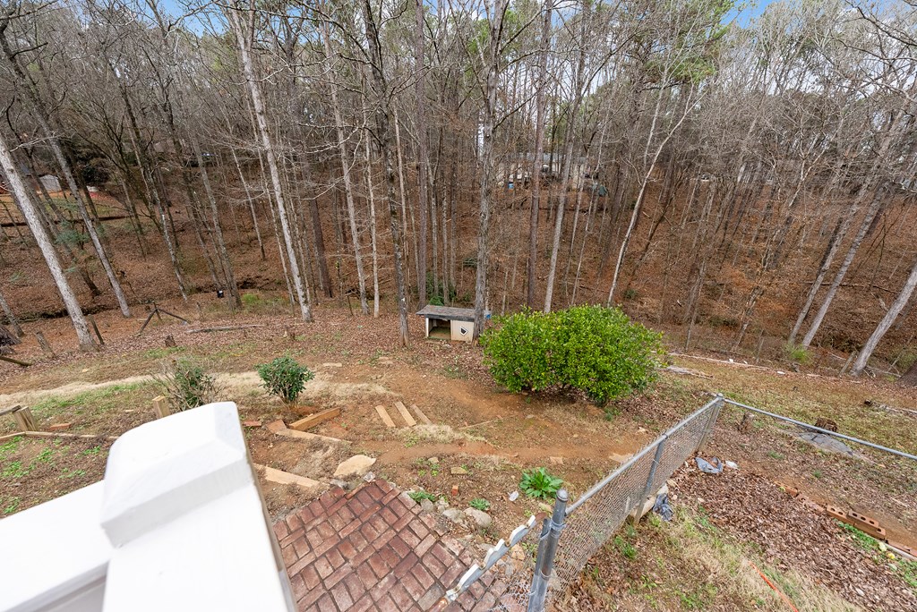 370 Evergreen Drive Fortson, GA 31808 - Photo 31 of 32 a view of a backyard with large trees