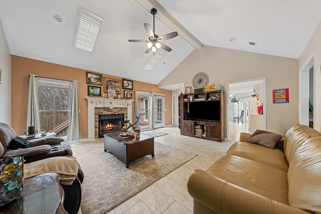 370 Evergreen Drive Fortson, GA 31808 - Photo 4 of 32 a living room with furniture and a fireplace