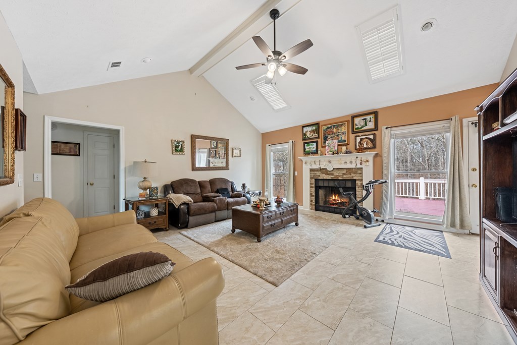 370 Evergreen Drive Fortson, GA 31808 - Photo 5 of 32 a bed room with furniture and a fireplace