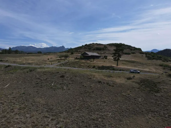 a view of a lake with mountains in the background
