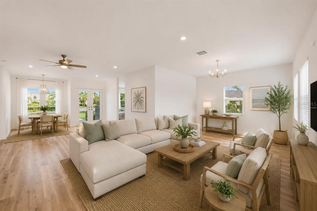 1215 Rio De Janeiro Avenue Punta Gorda, FL 33983 - Photo 4 of 65 a living room with furniture and a large window