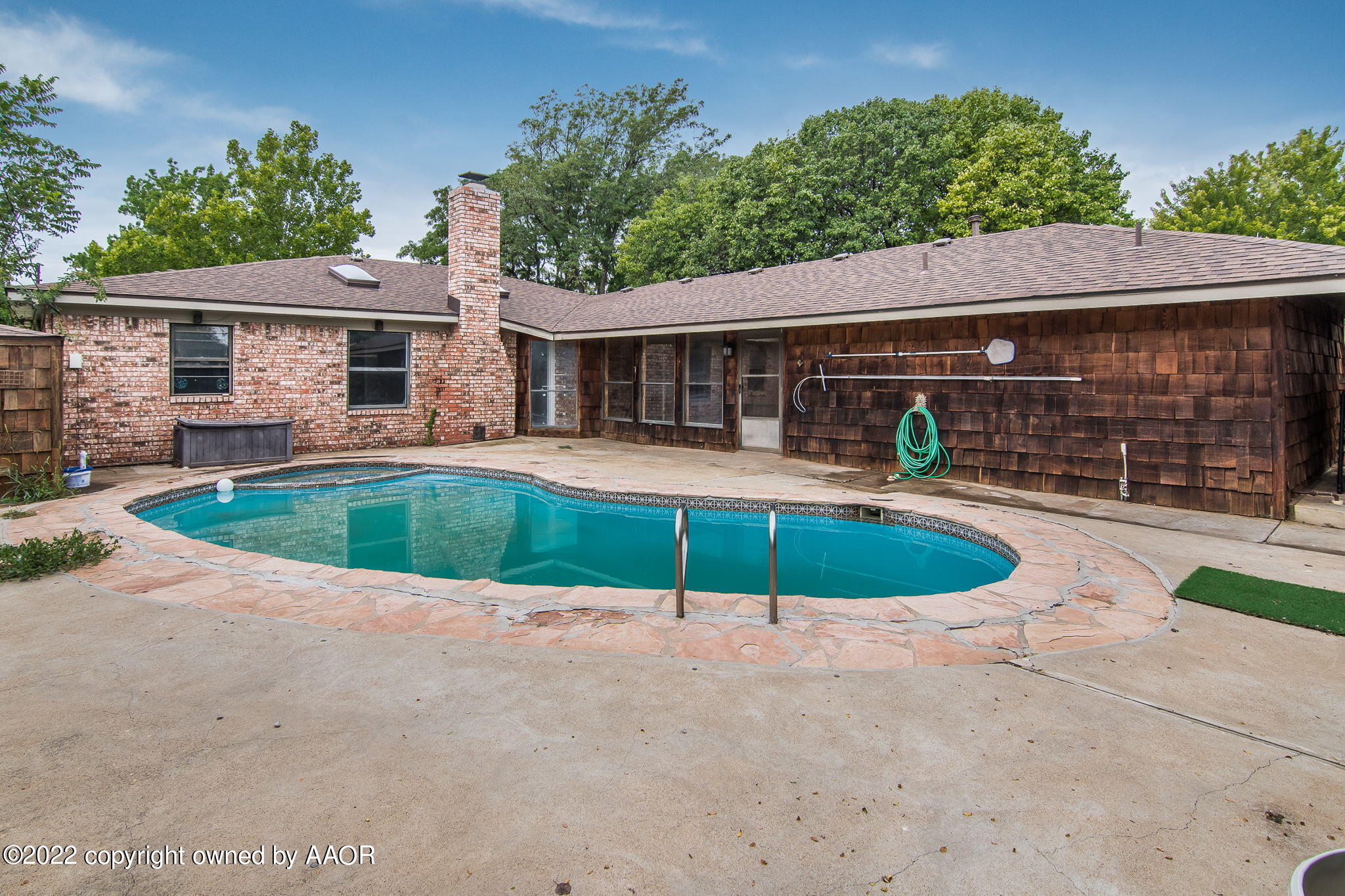 7720 Canode Drive Amarillo, TX 79121 - Photo 19 of 21 a house view with a outdoor space