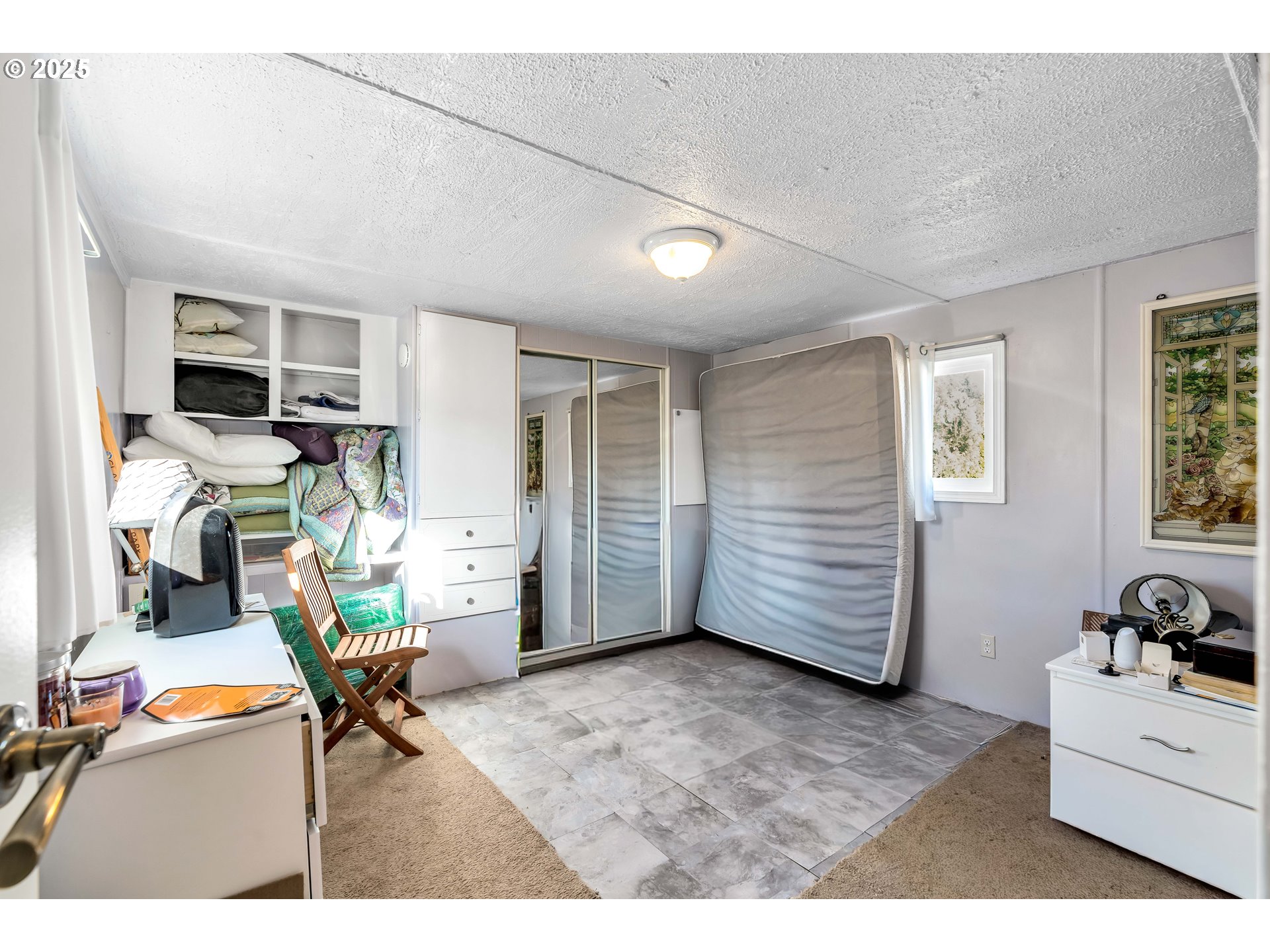 23 3364 Sunnyview Road Salem, OR 97301 - Photo 13 of 22 a view of a workspace with furniture and a window