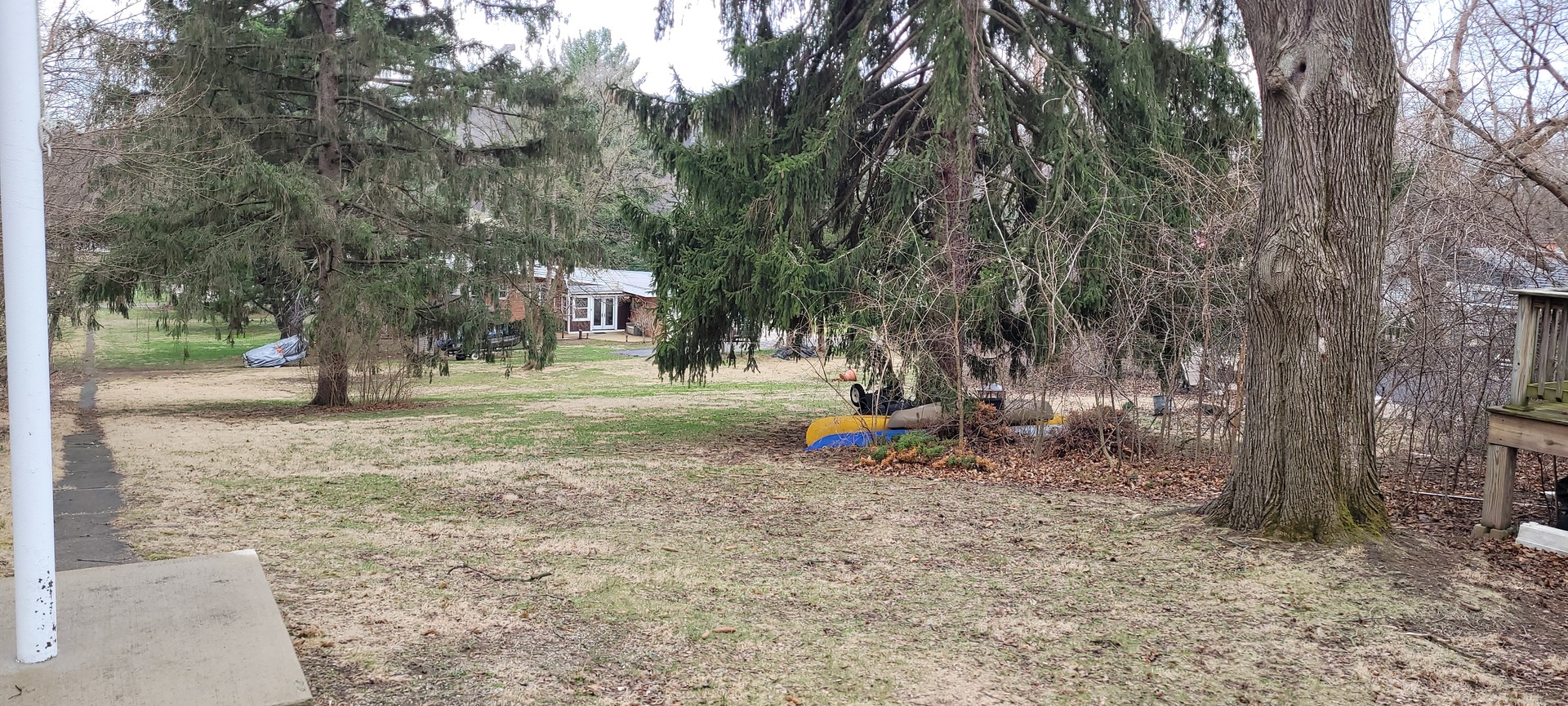 401 Woodbine Road Cary, IL 60013 - Photo 17 of 19 a backyard of a house with lots of green space