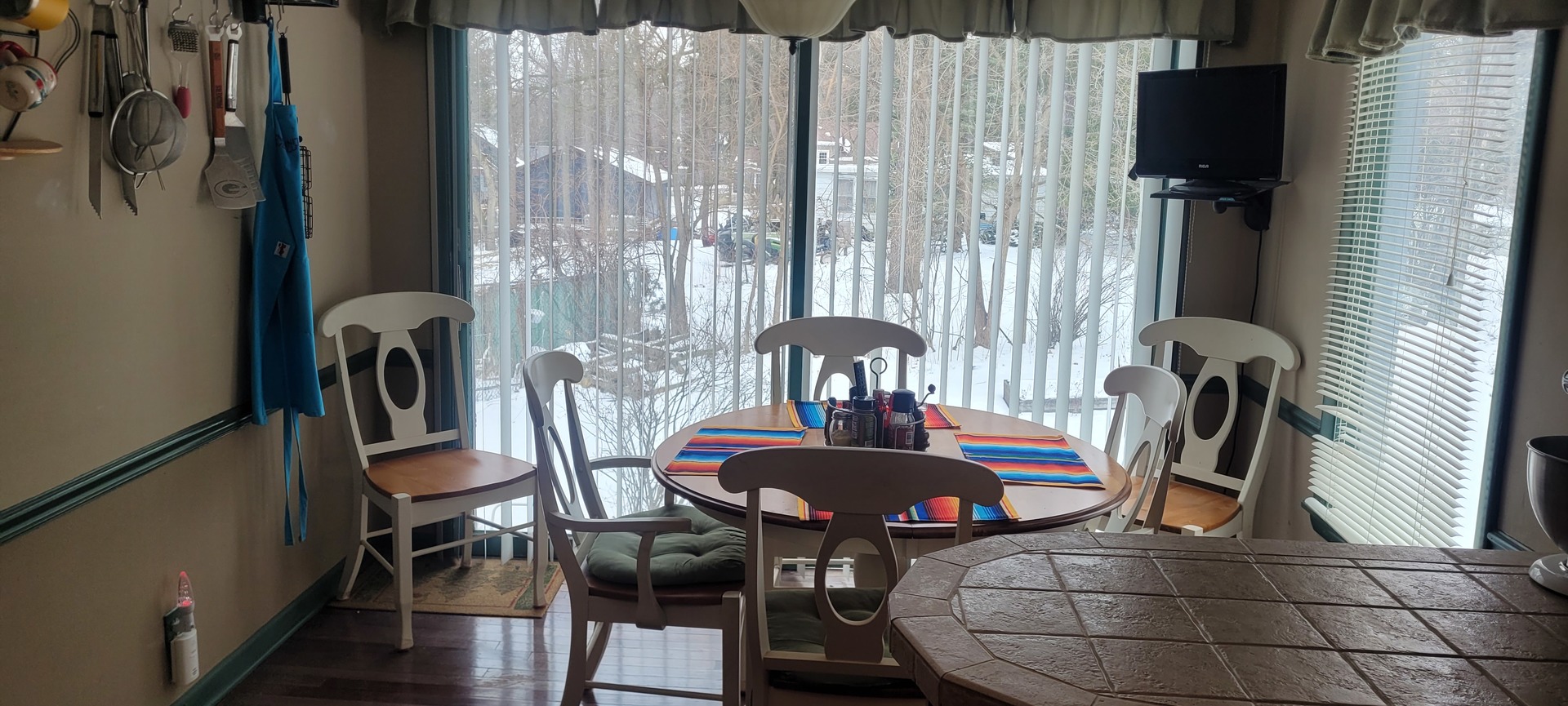401 Woodbine Road Cary, IL 60013 - Photo 7 of 19 a view of a dining room with furniture and chandelier