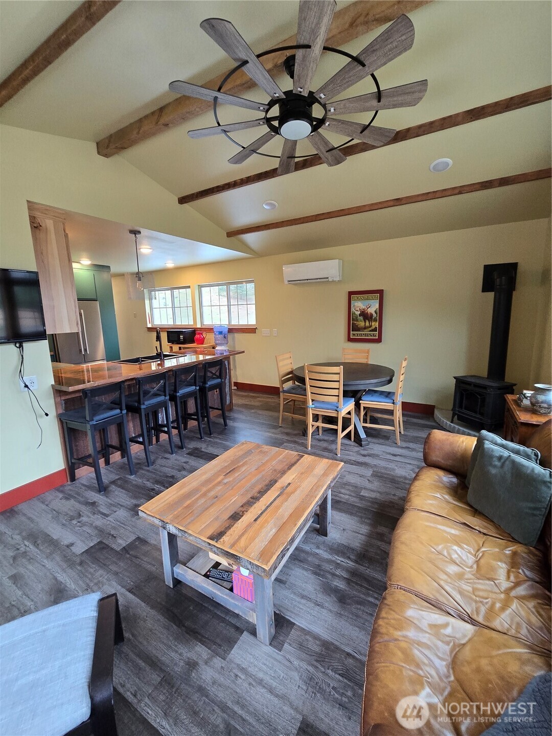 23 Allemandi Road Loomis, WA 98827 - Photo 13 of 23 a living room with furniture a dining table with wooden floor