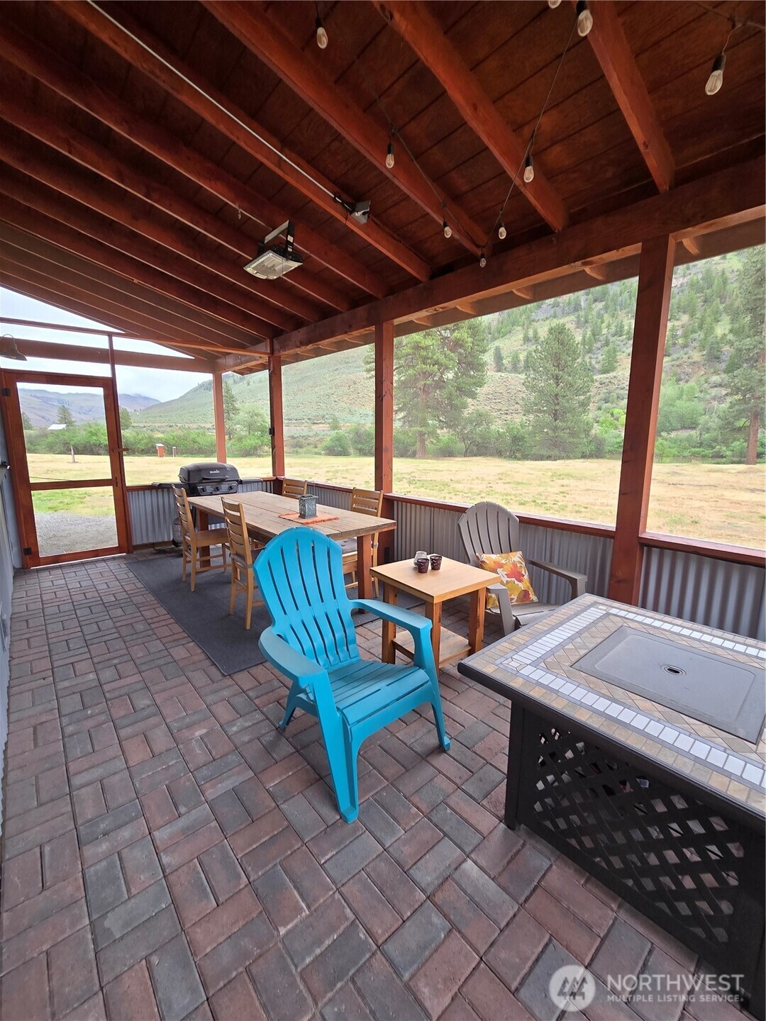 23 Allemandi Road Loomis, WA 98827 - Photo 21 of 23 a outdoor space with chairs and couch