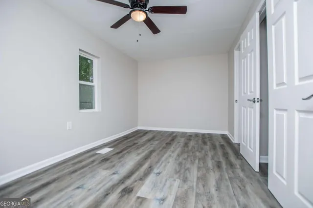 a bathroom with a sink a mirror and a bathtub