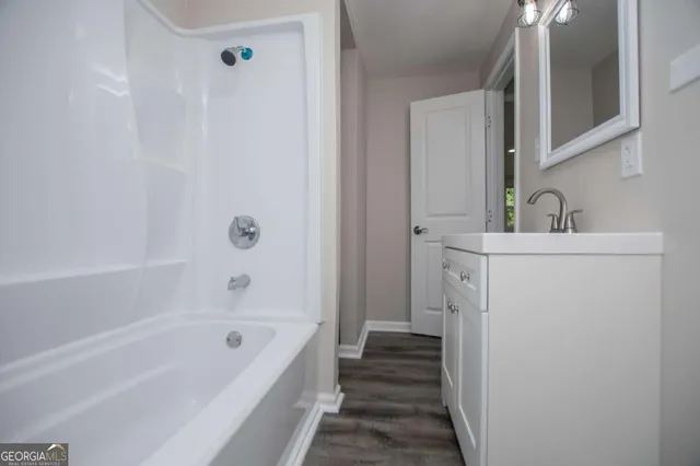 a front view of a house with a deck