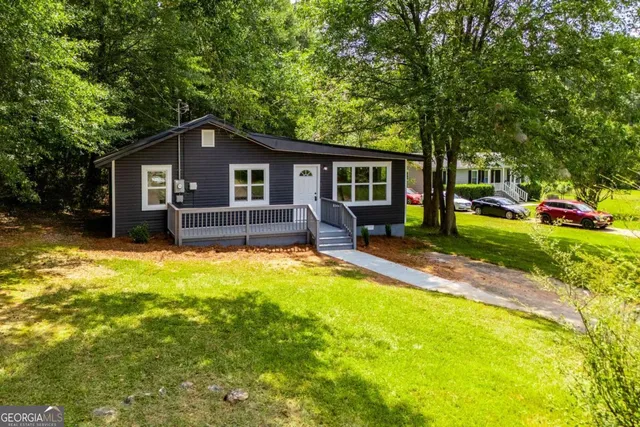 front view of a house with a yard