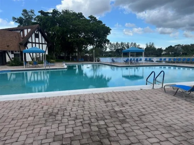 a view of a lake with a yard