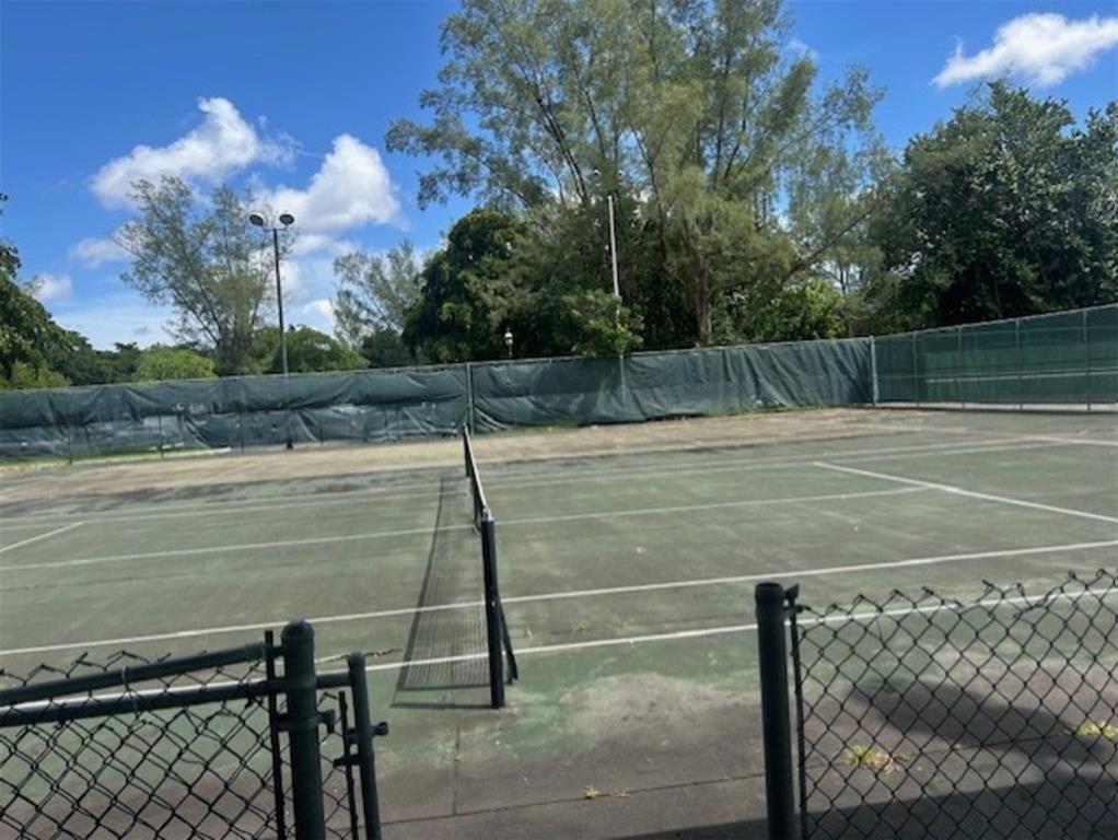 3720 Inverrary Drive, Unit 1T Lauderhill, FL 33319 - Photo 36 of 36 a view of a tennis court