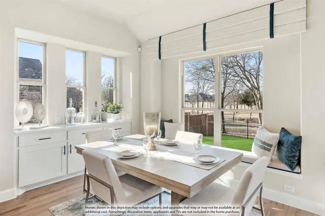 a spacious bedroom with a large bed and a large window