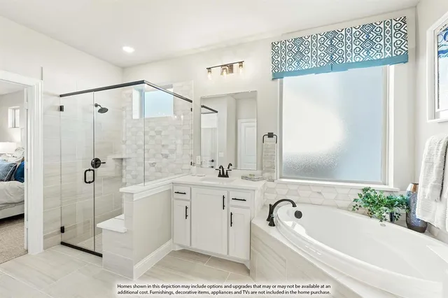 a bathroom with a granite countertop sink mirror and a bathtub