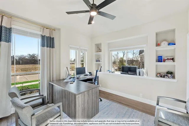 a view of a hallway and a livingroom with furniture