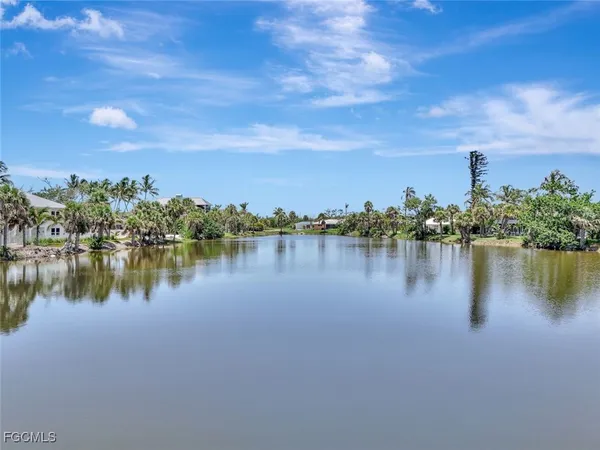a view of a lake with a building in front of it